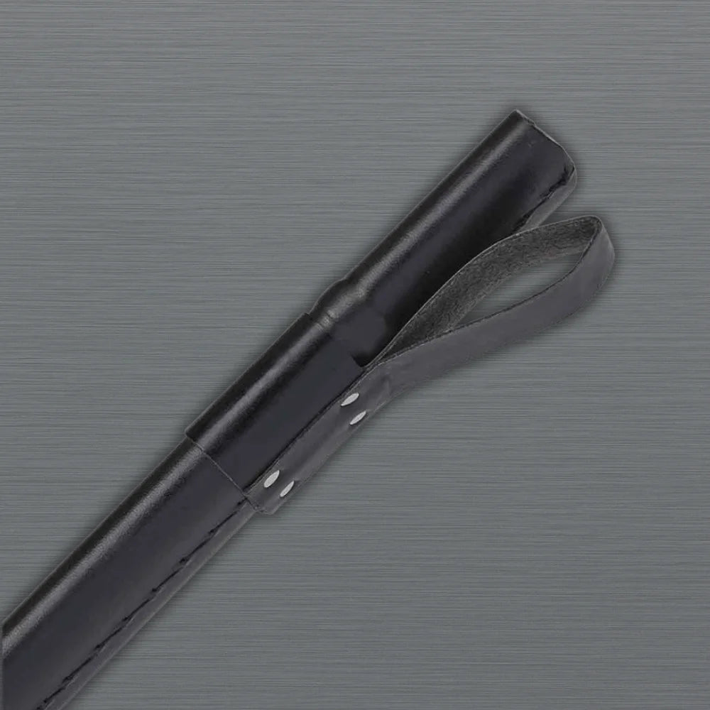 Black Viking sword with runic designs handle close-up
