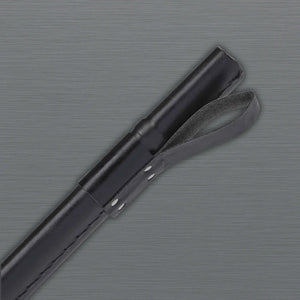 Black Viking sword with runic designs handle close-up