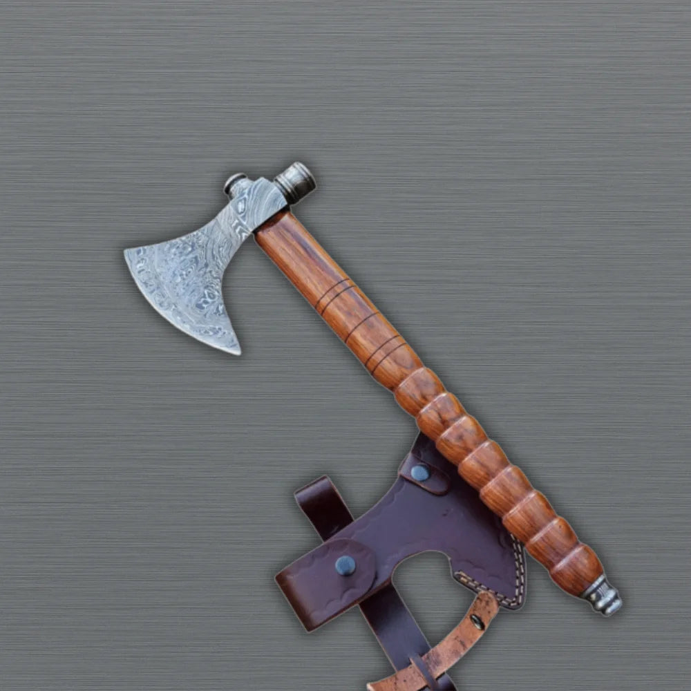 Viking tomahawk axe with pipe bowl close-up