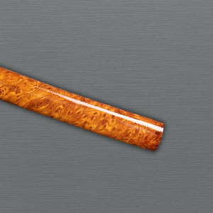 Artisan-crafted clay-tempered katana on display handle