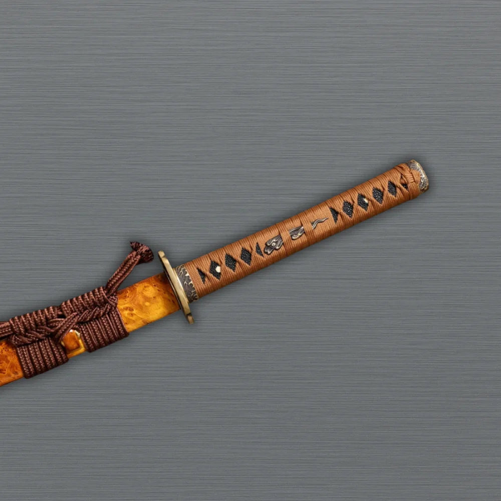 Artisan-crafted clay-tempered katana on display stand