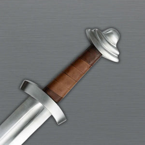 Viking Sword with brown handle and silver blade on a metallic background